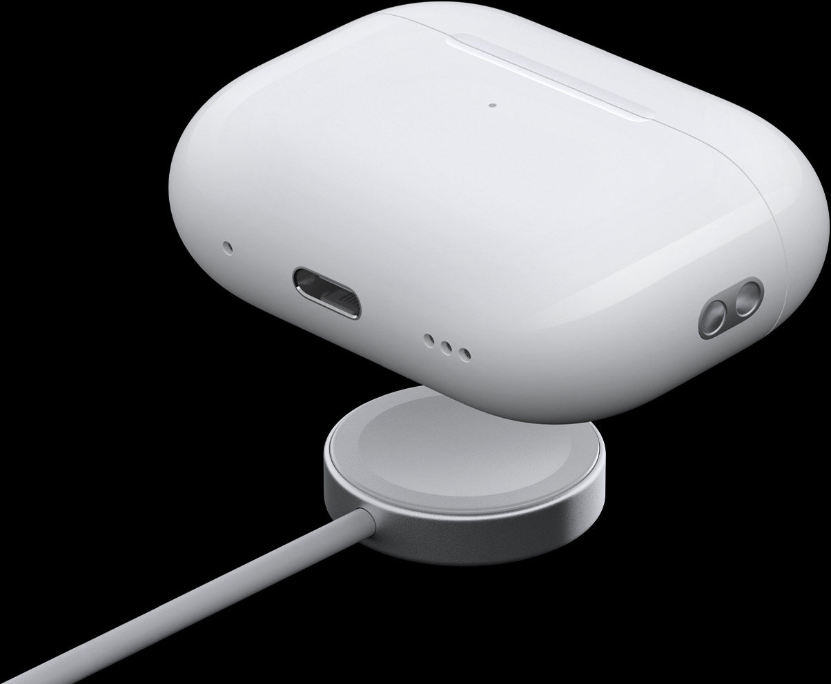 Boîtier AirPods Pro 2 en lévitation au dessus d'un chargeur Magsafe